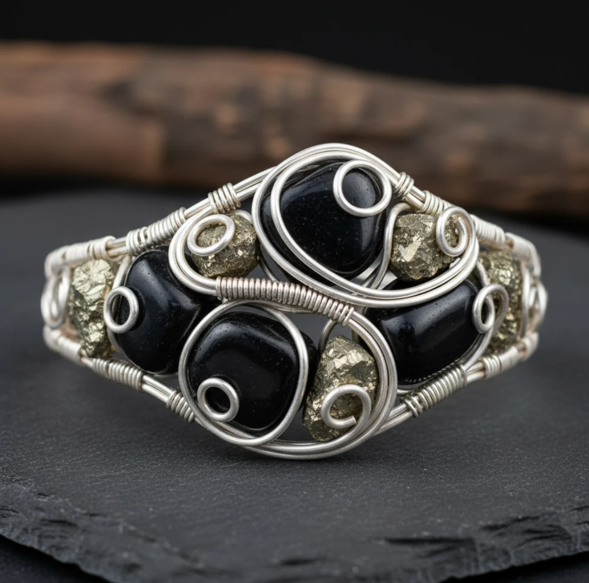 “Pyrite calls in the wealth, Obsidian guards it—abundance protected.” Custom Wire Wrapped Pyrite And Black Obsidian Dual Stone bracelet